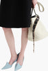 White/Black - Prada Buckle Leather Bucket Bag With Studded Belt - GLAM MODA